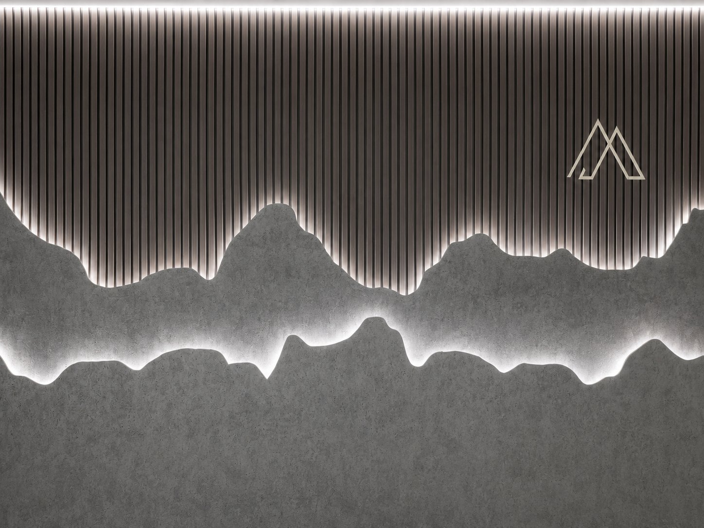 Pared de montañas con iluminación LED de neón en Clínica Impulso